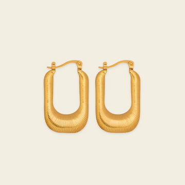 Fluted Arc Earrings with elongated rectangular hoops with ridged surfaces in gold finish