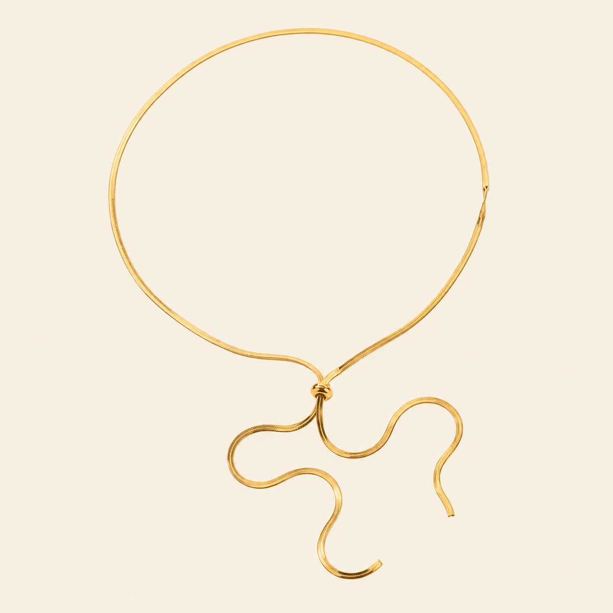 Glide Drop Necklace with a smooth collar with a flowing lariat drop in gold finish