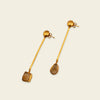 Golden Ease Earrings with slender gold-coloured stems with small amber-coloured drops