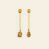 Golden Ease Earrings with slender gold-coloured stems with small amber-coloured drops