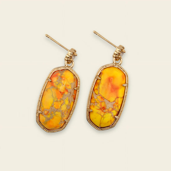 Golden Field Earrings with yellow and orange patterned rectangular stone drops