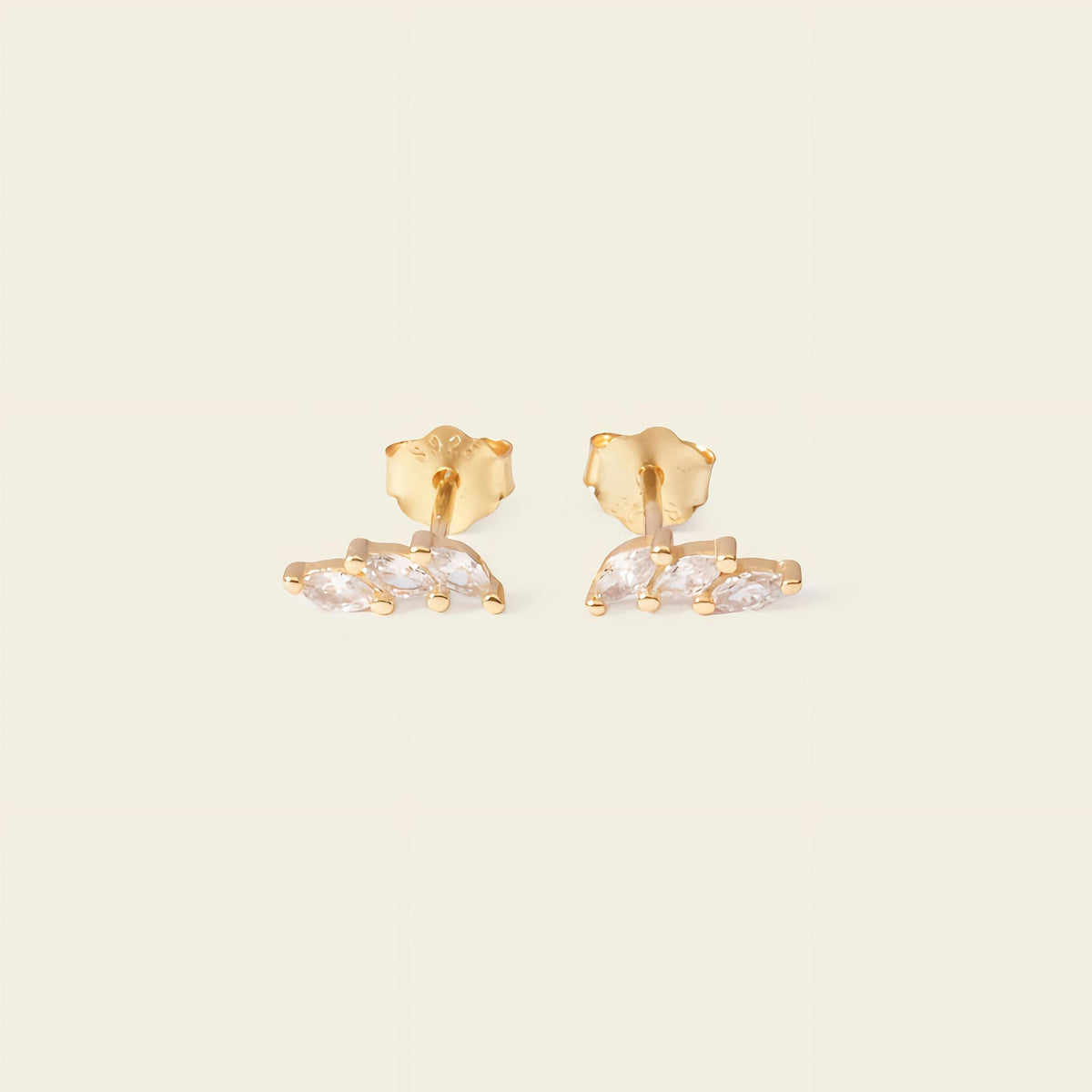Grace Line Earrings with slender curved bars with clear stone accents in gold finish