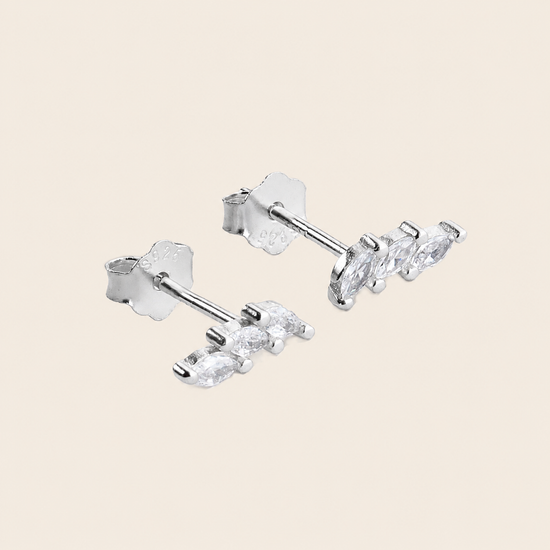 Grace Line Earrings with slender curved bars with clear stone accents in silver finish