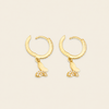 Grace Wing Earrings with butterfly charms suspended from small hoops in gold finish