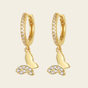 Grace Wing Earrings with butterfly charms suspended from small hoops in gold finish