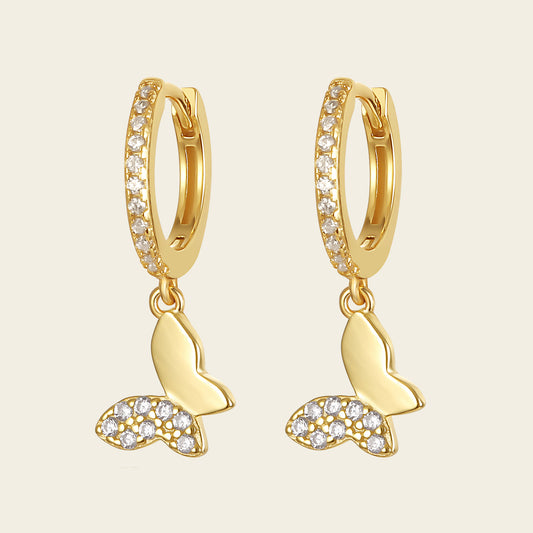 Grace Wing Earrings with butterfly charms suspended from small hoops in gold finish