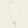 Grace Wing Necklace with a butterfly motif and a hanging clear stone in gold finish