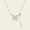 Grace Wing Necklace with a butterfly motif and a hanging clear stone in silver finish