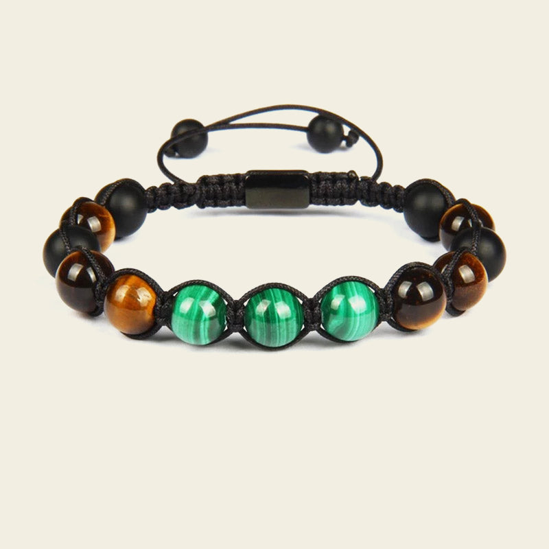 Green Axis Bracelet with green and dark round beads with an adjustable cord