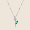 Green Bloom Necklace with a slender stem pendant and green leaf-shaped stone in silver finish