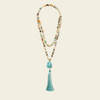 Harbour Mala Necklace with pale stone beads and a turquoise-coloured tassel