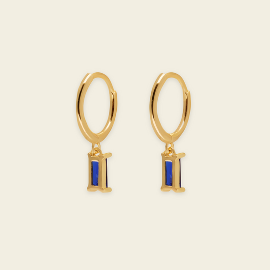 Indigo Baguette Earrings with small hoops with rectangular blue stone drops in gold finish