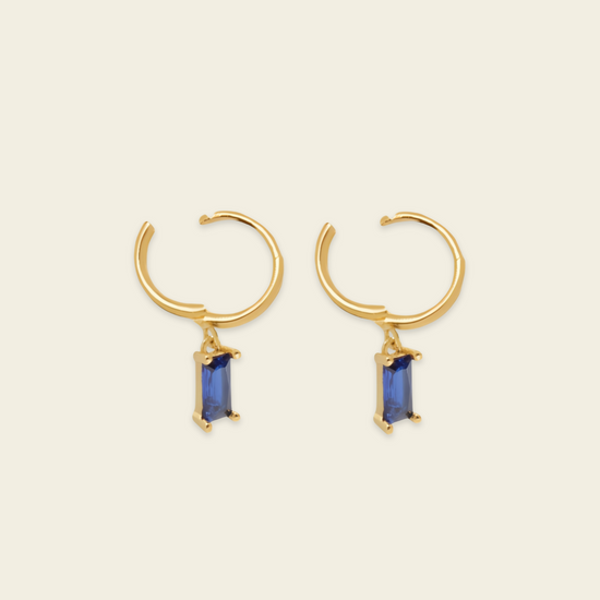 Indigo Baguette Earrings with small hoops with rectangular blue stone drops in gold finish