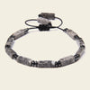 Interval Hold Bracelet with elongated stone beads on an adjustable cord