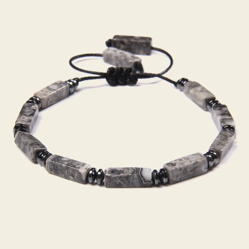 Interval Hold Bracelet with elongated stone beads on an adjustable cord