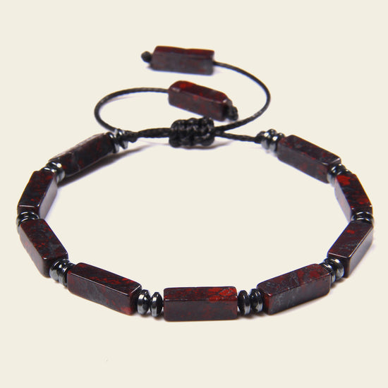 Interval Hold Bracelet with elongated stone beads on an adjustable cord