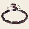 Interval Hold Bracelet with elongated stone beads on an adjustable cord