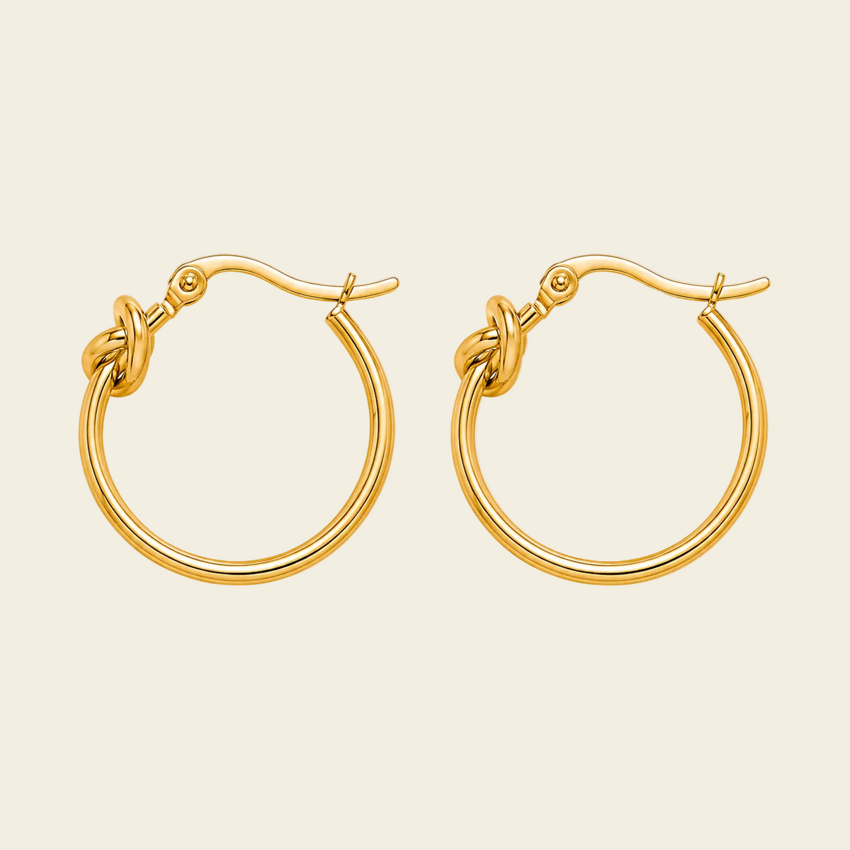 Knotted Loop Earrings with oval hoops with knot details in gold finish
