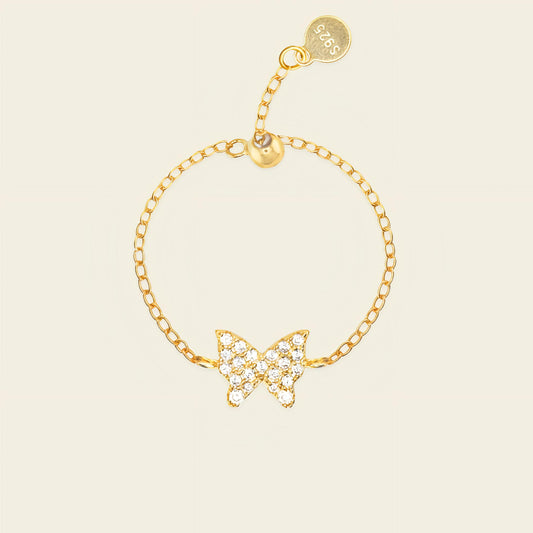 Light Wing Ring with a butterfly motif on a fine chain band in gold finish