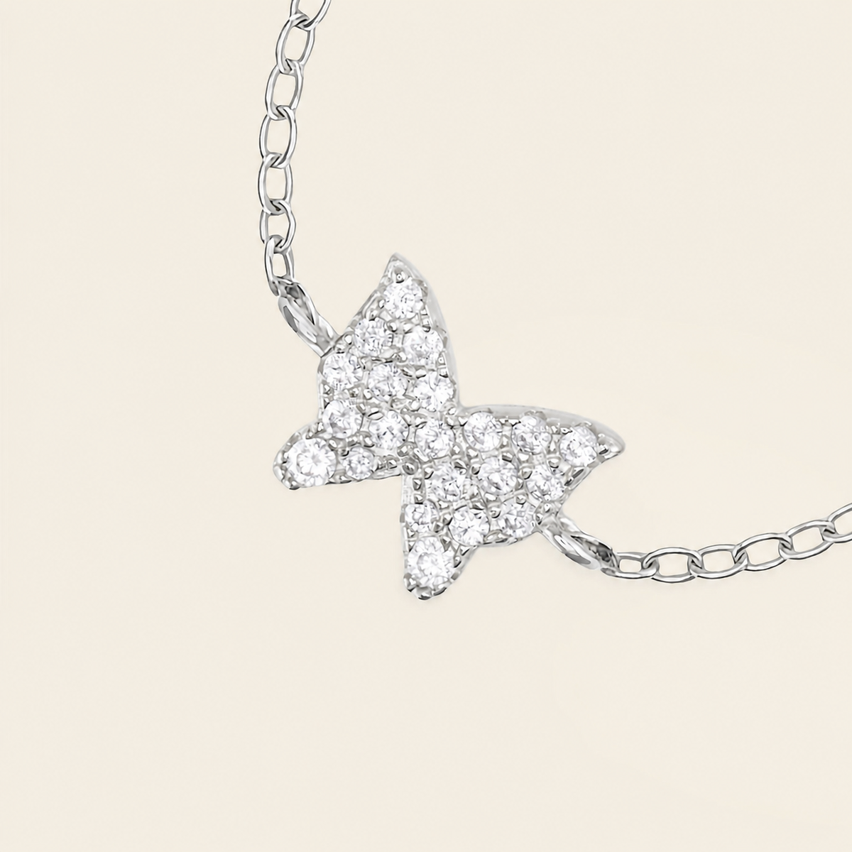 Light Wing Ring with a butterfly motif on a fine chain band in silver finish