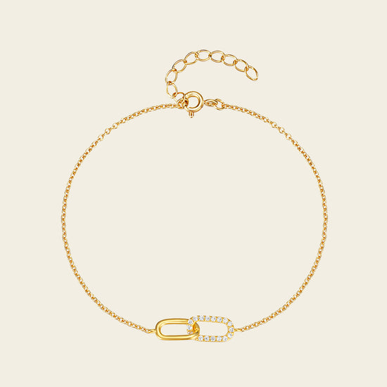 Linked Oval Bracelet with a fine chain and linked oval centre in gold finish