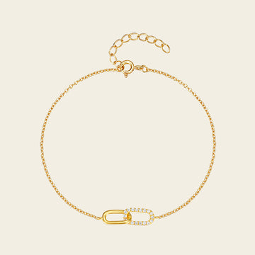 Linked Oval Bracelet with a fine chain and linked oval centre in gold finish