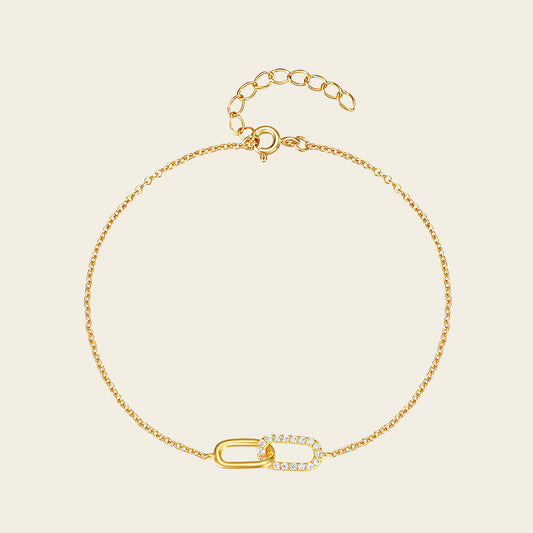 Linked Oval Bracelet with a fine chain and linked oval centre in gold finish