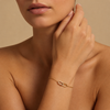 Linked Oval Bracelet worn on the wrist in gold finish
