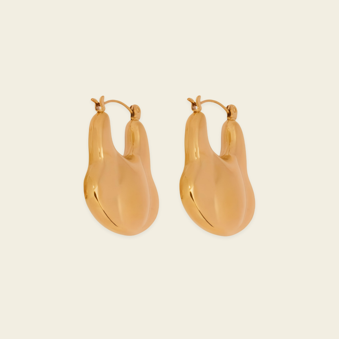 Liquid Loop Earrings with broad polished irregular hoop shapes in gold finish