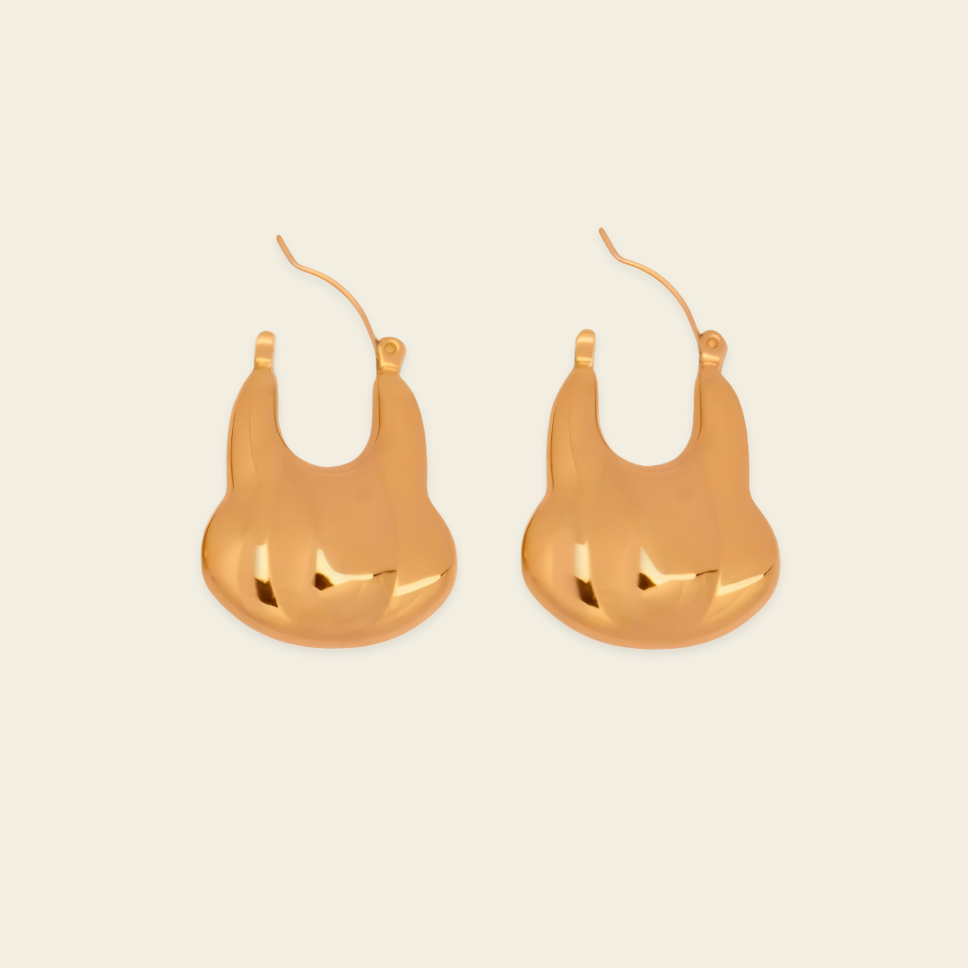 Liquid Loop Earrings with broad polished irregular hoop shapes in gold finish
