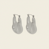 Liquid Loop Earrings with broad polished irregular hoop shapes in silver finish
