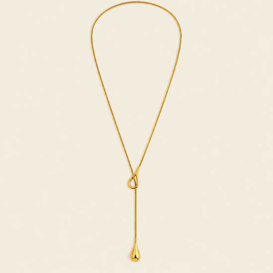 Liquid Loop Necklace with a fine lariat chain with an open loop and teardrop end in gold finish