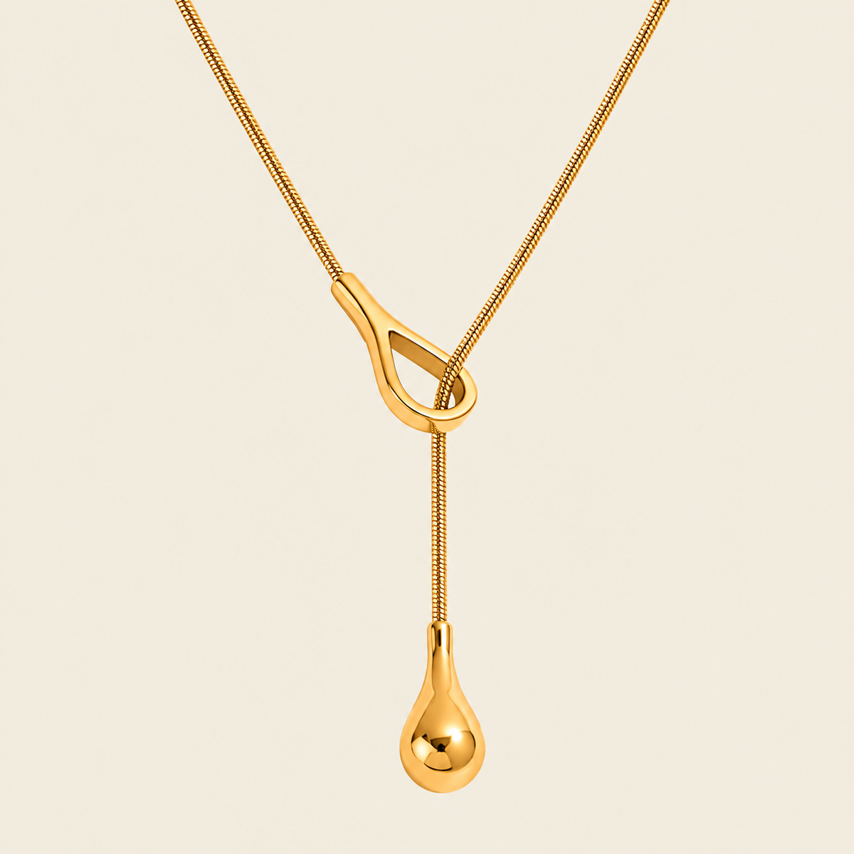 Liquid Loop Necklace with a fine lariat chain with an open loop and teardrop end in gold finish