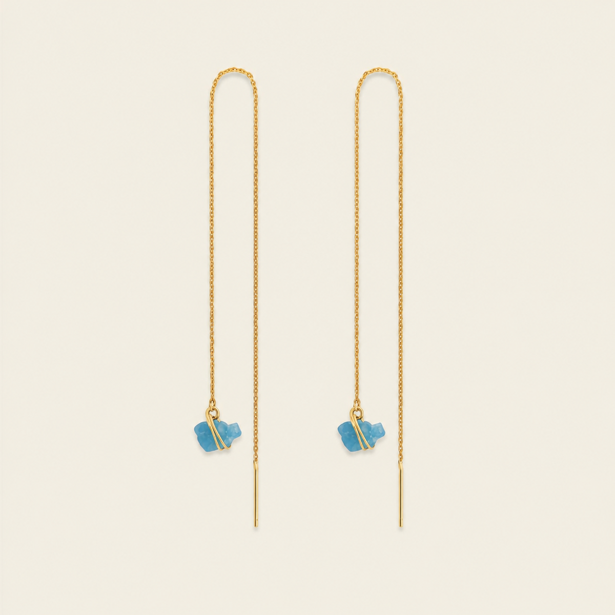 Long Drift Earrings with long fine gold-coloured hooks and small blue stone drops