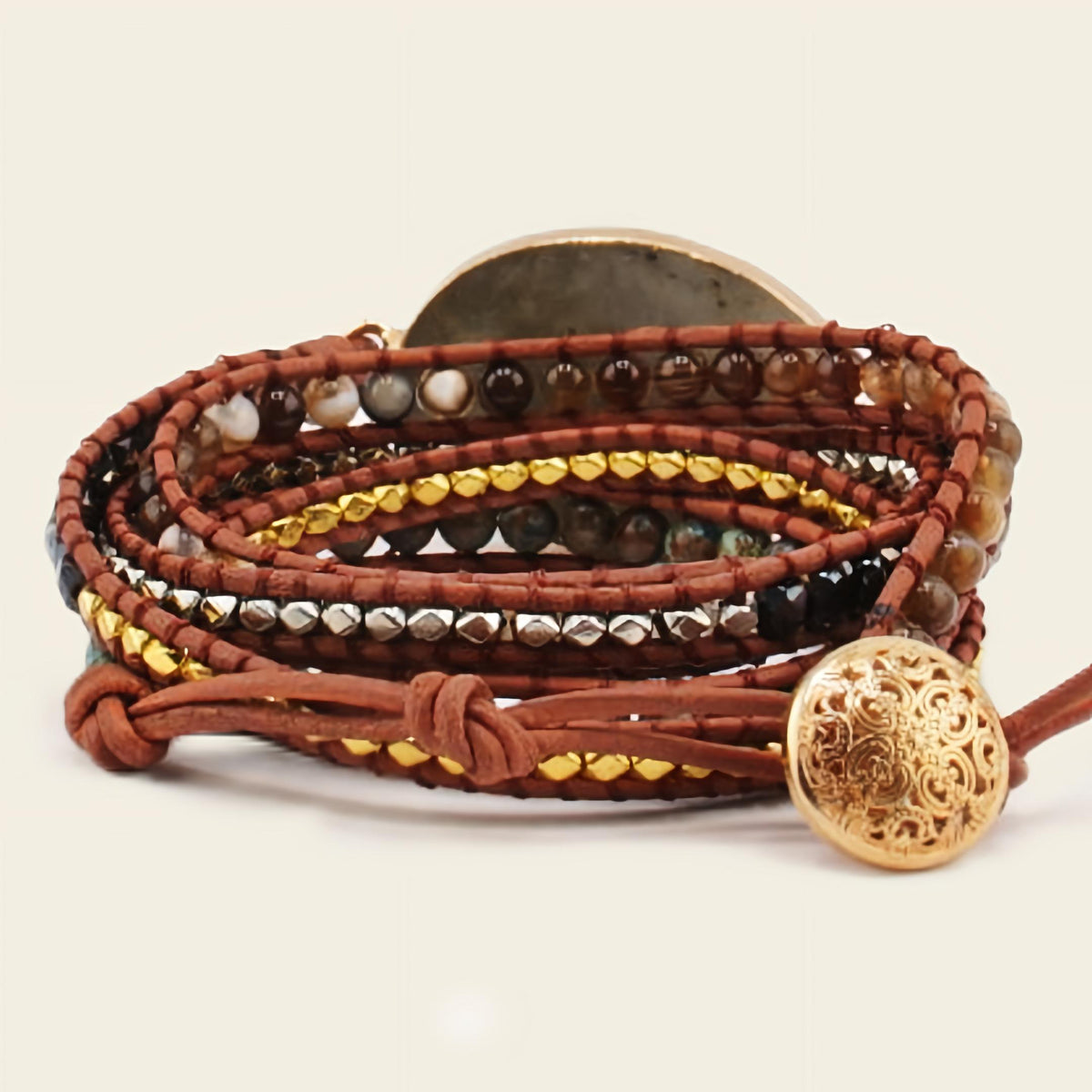 Luna Crest Bracelet with layered earth-toned beads and an oval stone centre