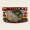 Luna Crest Bracelet with layered earth-toned beads and an oval stone centre