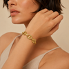 Mariner Link Cuff worn on the wrist in gold finish