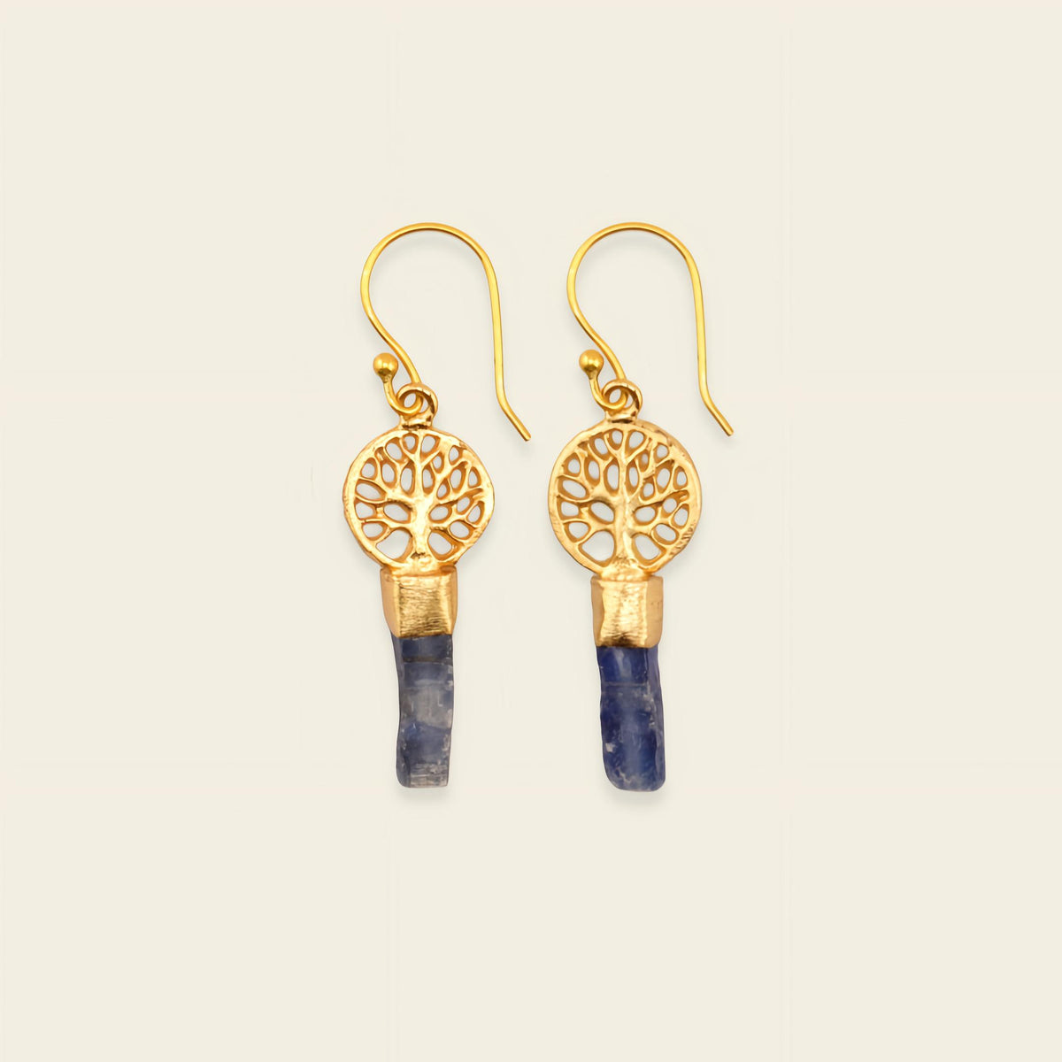 Midnight Roots Earrings with round gold-coloured motifs above slim blue stone drops