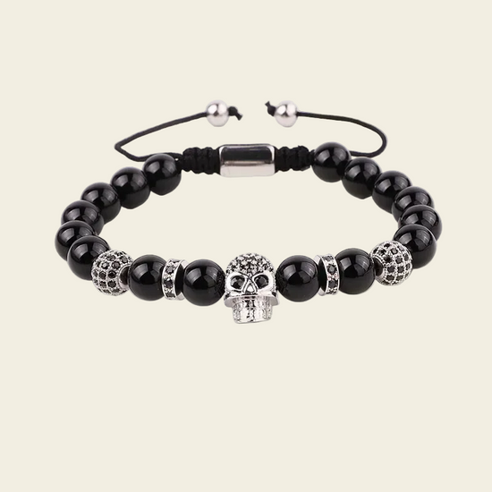 Midnight Skull Bracelet with dark round beads and skull-shaped metal accents