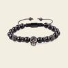 Midnight Skull Bracelet with dark round beads and skull-shaped metal accents
