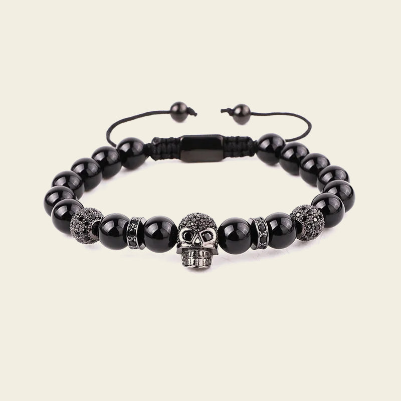 Midnight Skull Bracelet with dark round beads and skull-shaped metal accents