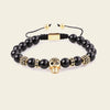 Midnight Skull Bracelet with dark round beads and skull-shaped metal accents