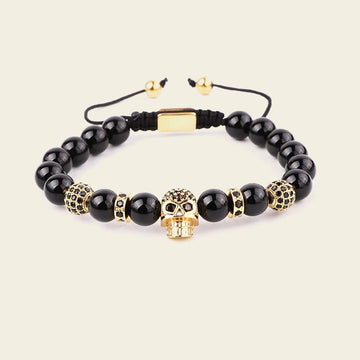 Midnight Skull Bracelet with dark round beads and skull-shaped metal accents
