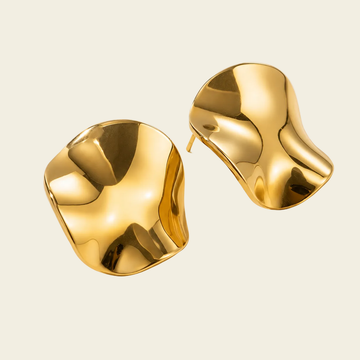 Molten Disc Earrings with rounded sculptural stud faces in gold finish