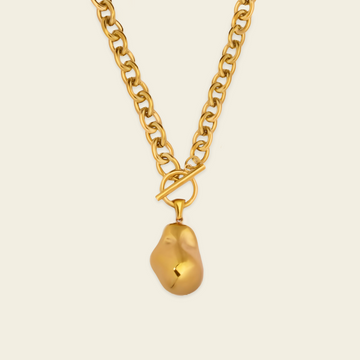 Molten Drop Necklace with a chunky chain and rounded teardrop pendant in gold finish