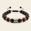 Night Axis Bracelet with dark round beads and a rectangular metal accent