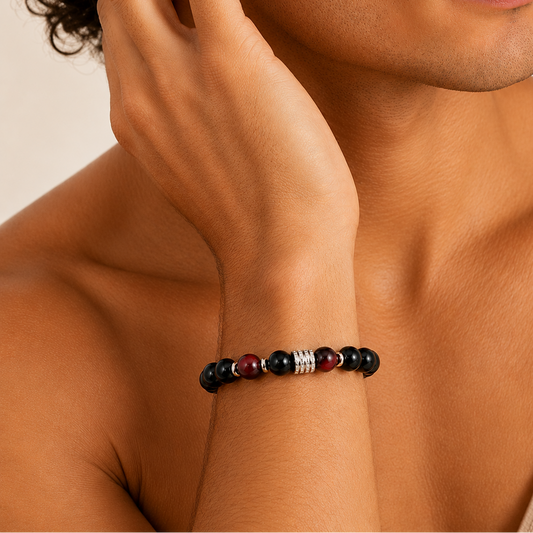 Night Axis Bracelet worn on the wrist, with dark round beads and a rectangular metal accent
