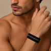 Nightmark Wrap Bracelet worn on the wrist, with layered dark faceted beads