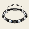 Obsidian Drift Bracelet with faceted round beads with small metal accents