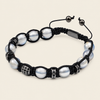 Obsidian Drift Bracelet with faceted round beads with small metal accents